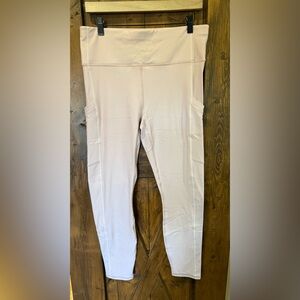 Fabletics High Waisted Cold Weather Pocket Leggings in Muted Mauve/Ecret